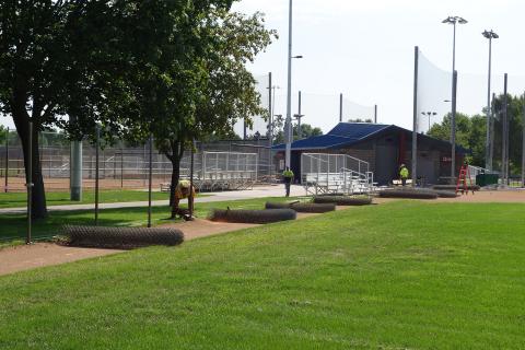 Worker cutting off post during Dred Fence Replacement August 2022
