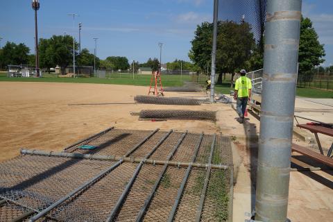 Dred Fence Replacement August 2022 with old fence on the ground and posts still up