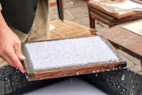 Photo of a person making paper