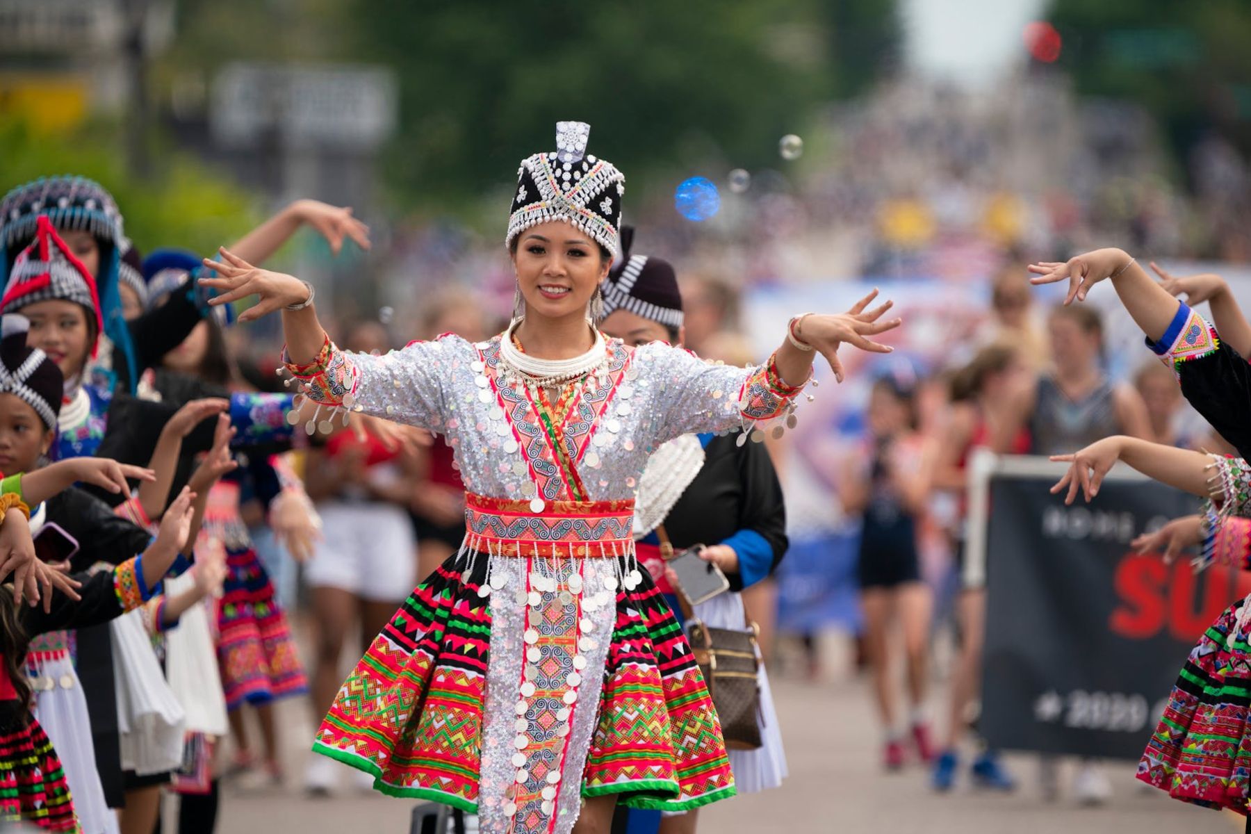 traditional Hmong attire and dance