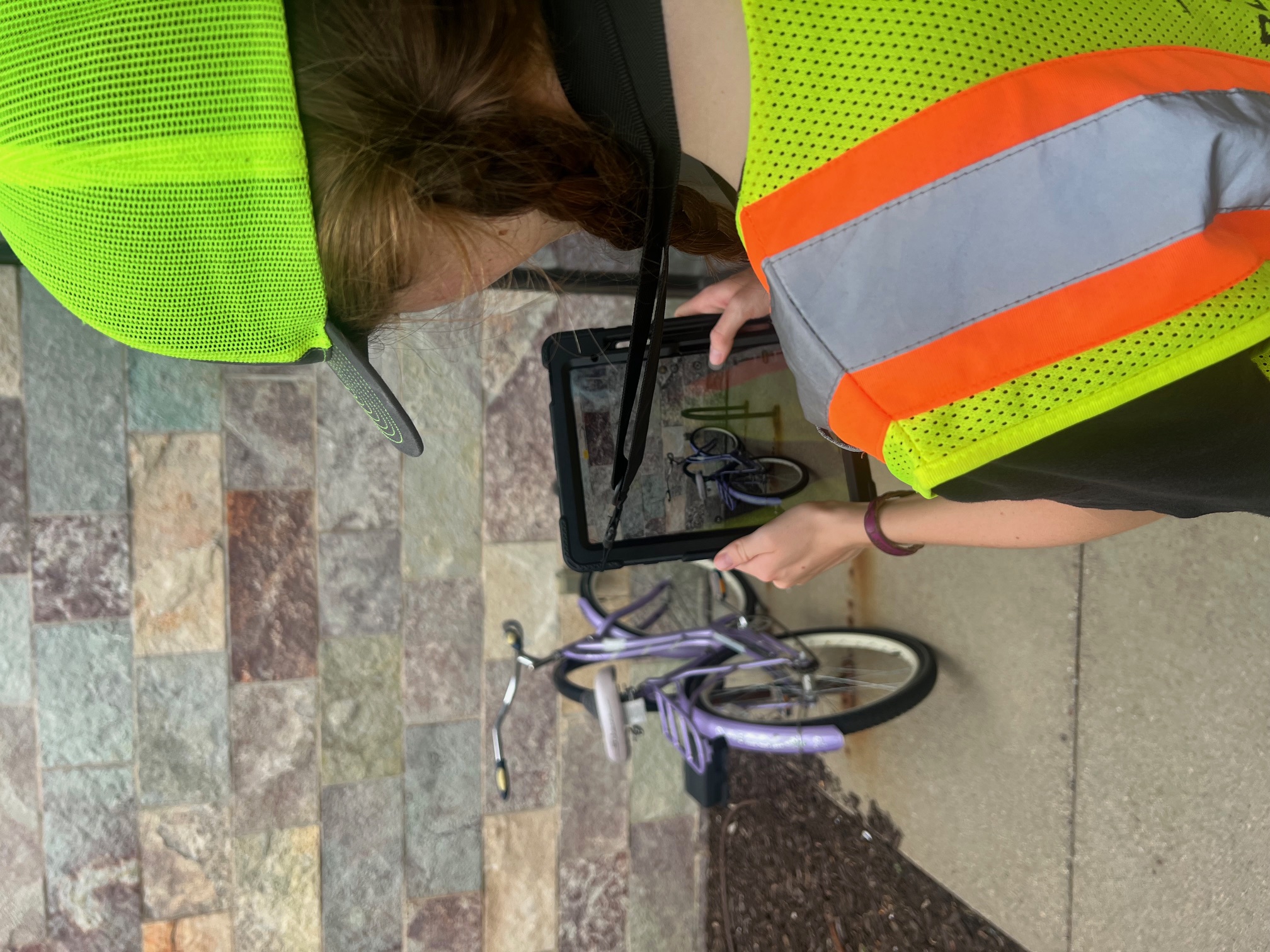Intern documenting a bike rack