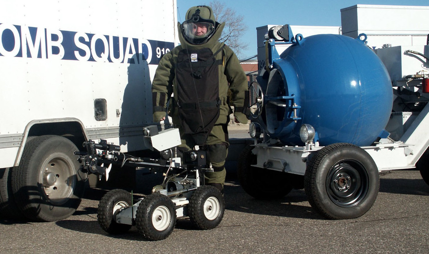 Bomb squad tech and robot