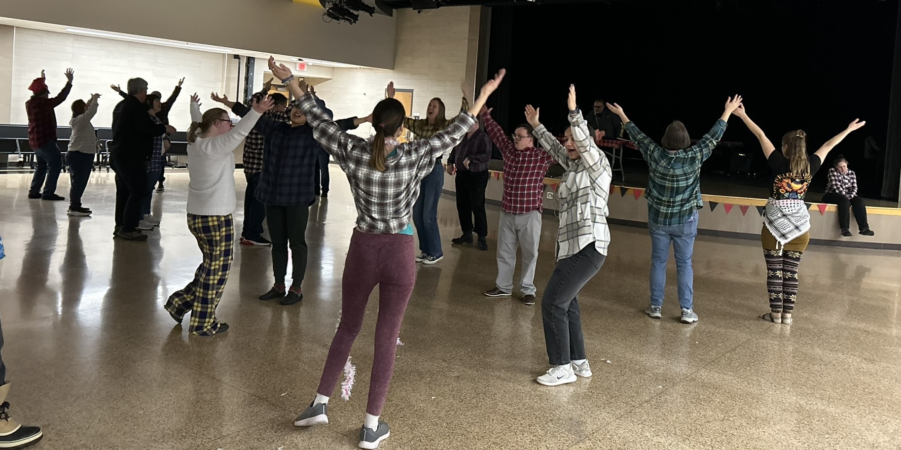 Adults participating in a Dance Your Socks Off adaptive dance event