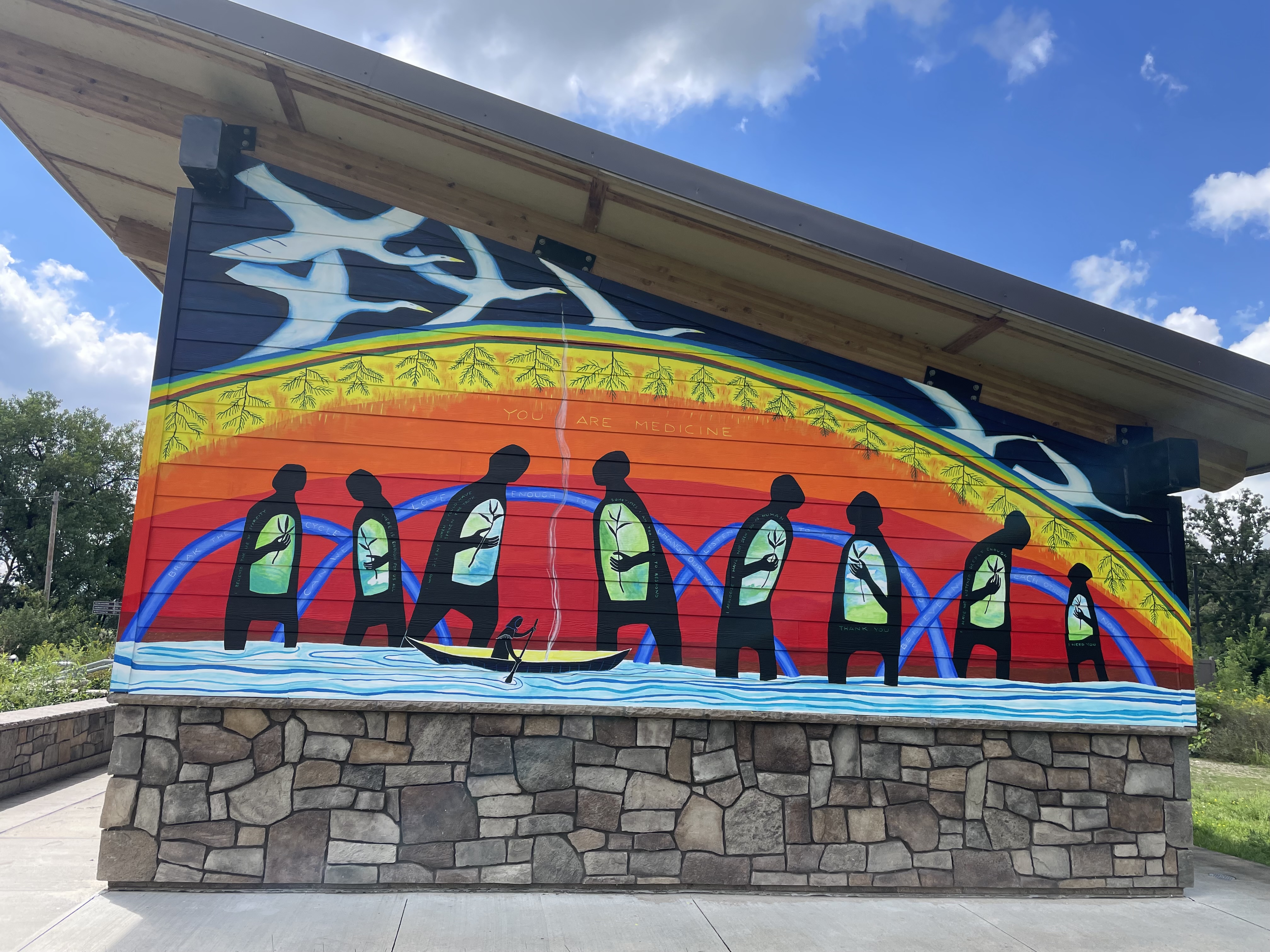 Colorful mural on slanted wall