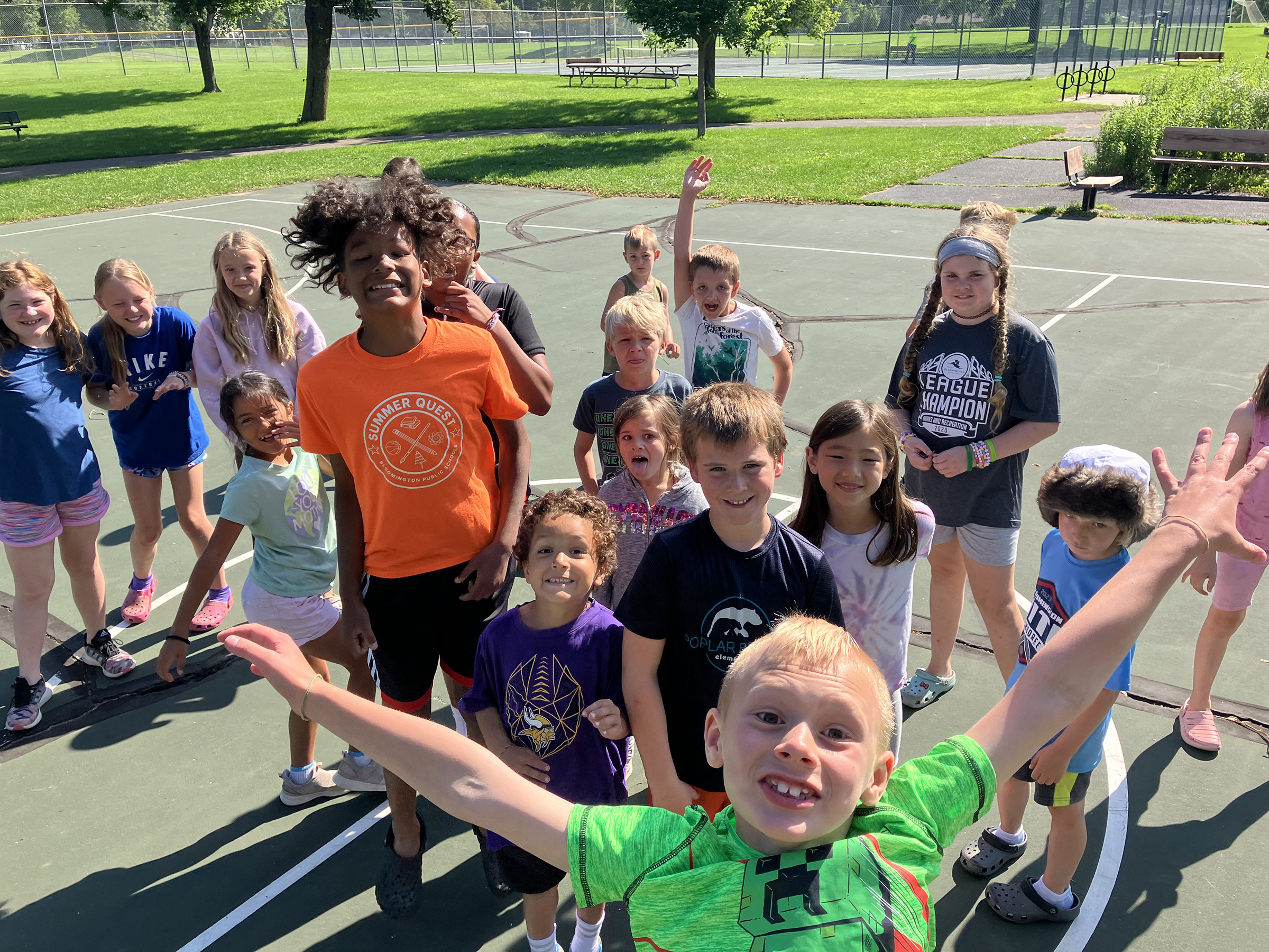 A group of happy kids enjoying a nice day in a park