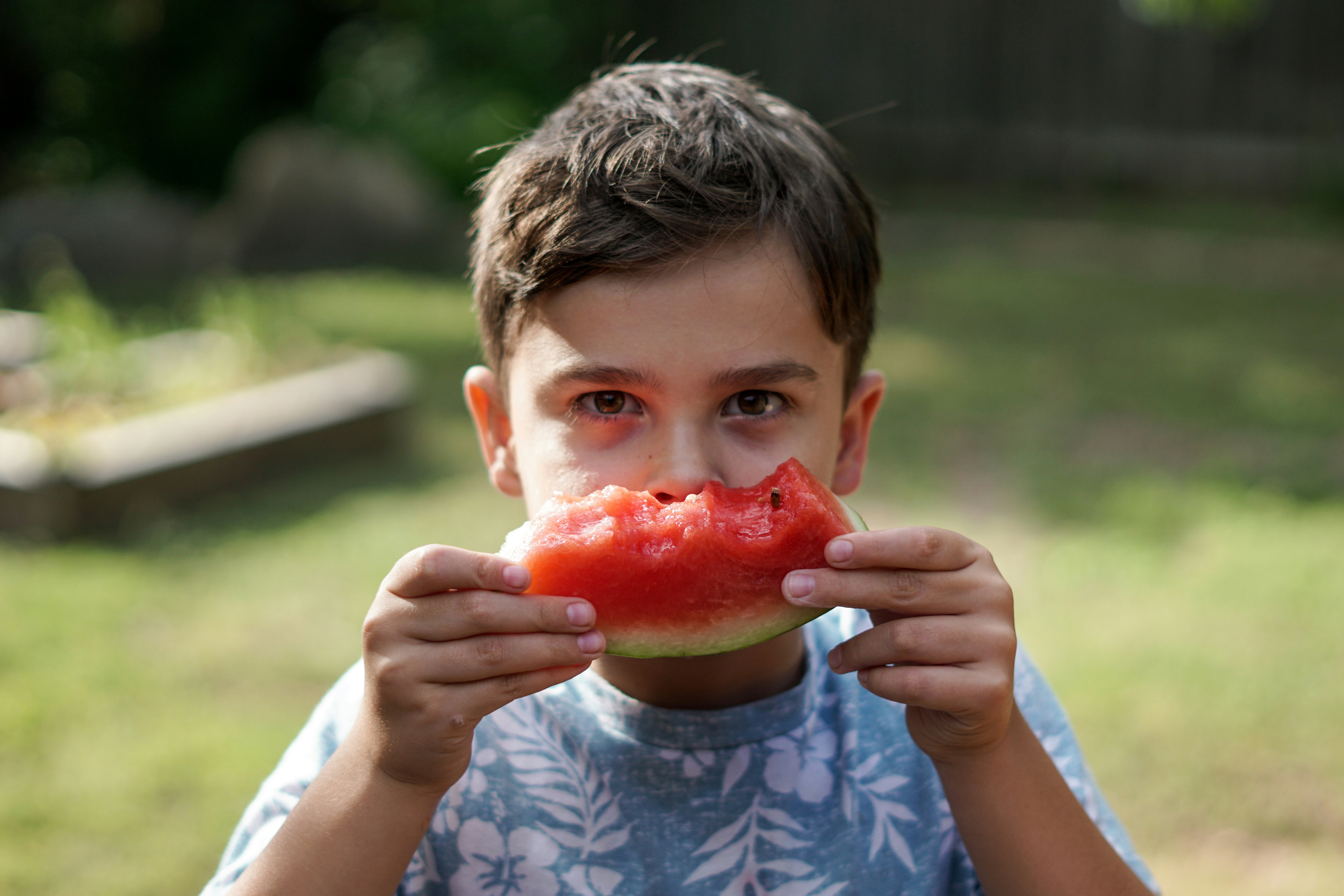 Young boy enjoying watermelon
