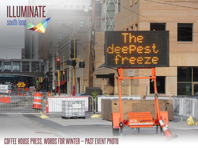 Streetscape with a road sign that says "the deepest freeze."