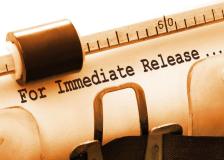 Close up of old fashioned typewriter writing for immediate release