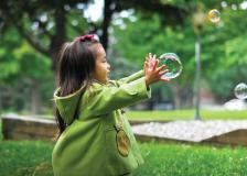 Child chasing a bubble