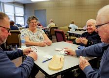 Seniors playing cribbage