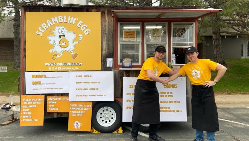 Scramblin' Egg proprietors in front of their food truck.