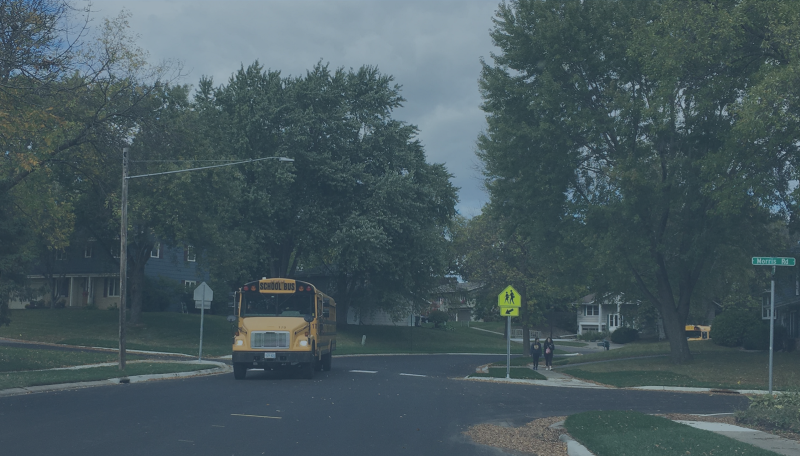 Showing bus stop with enhanced pedestrian crossing