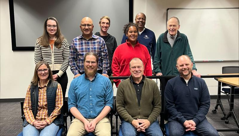 Ten Sustainability Commissioners smiling in a group photo