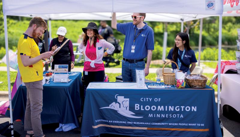 City Finance staff tabling an event