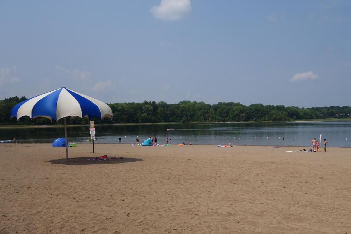 Bush Lake Beach with large umbrella