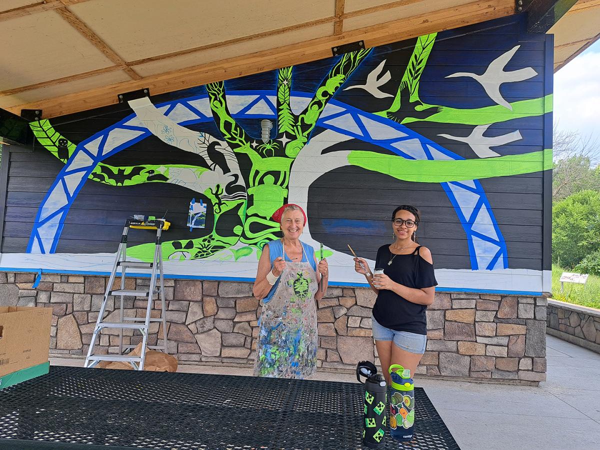 Mural progress at Old Cedar Ave Bridge Trailhead