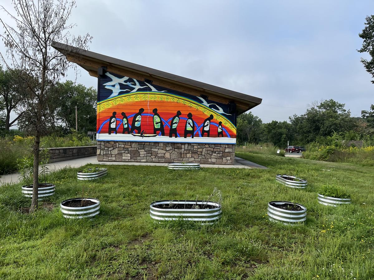 Mural in progress at Old Cedear Ave. Bridge - August 19, 2025