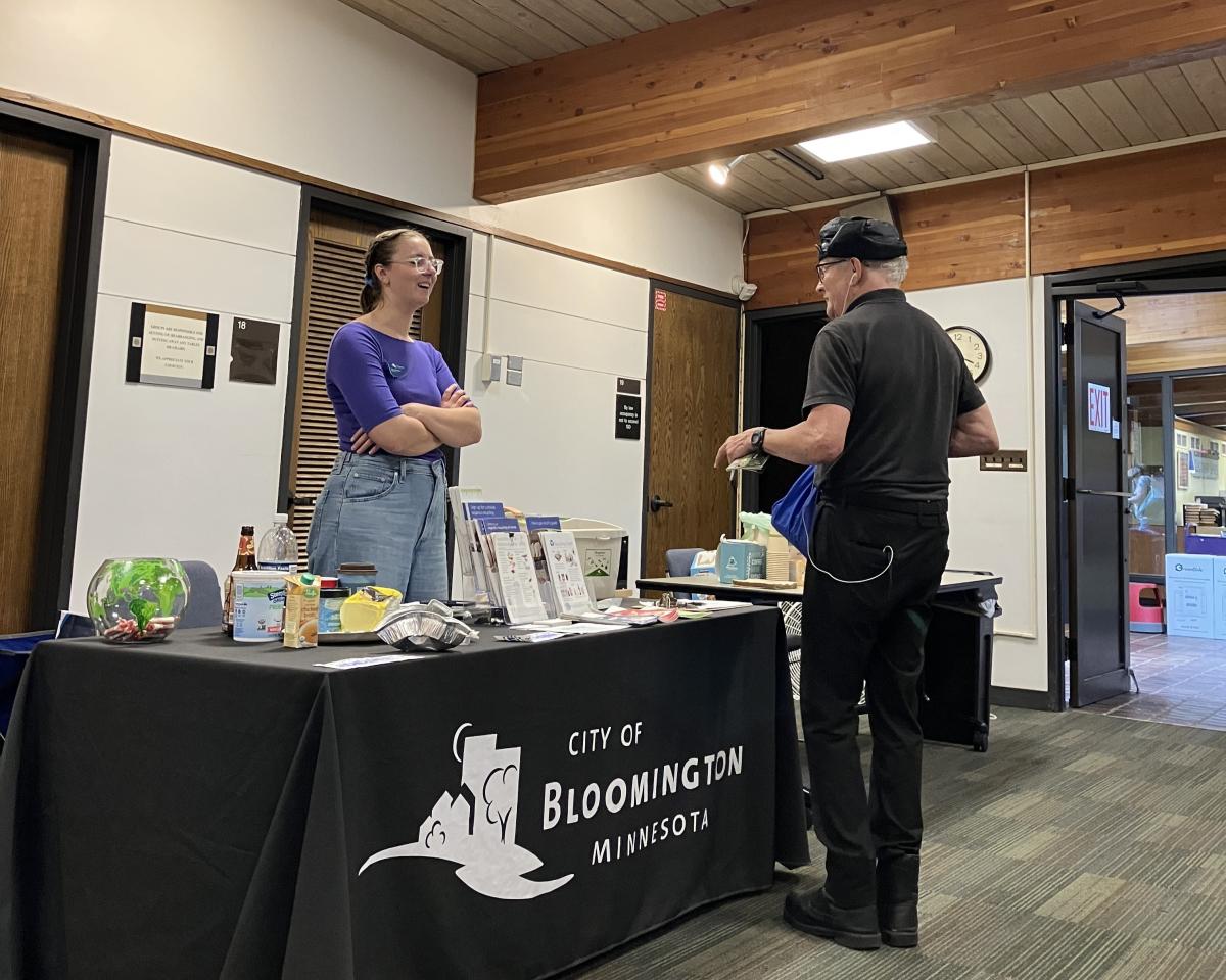 Person talking to staff