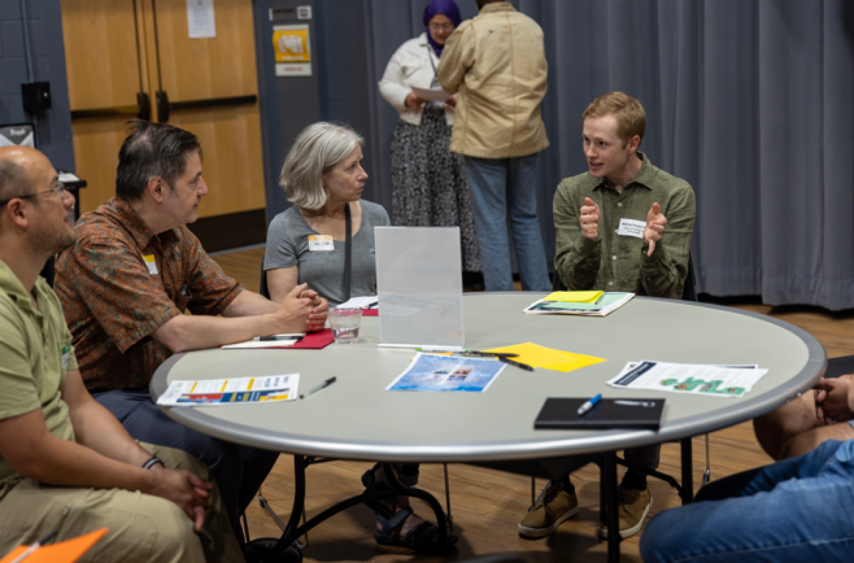 People talking at a table