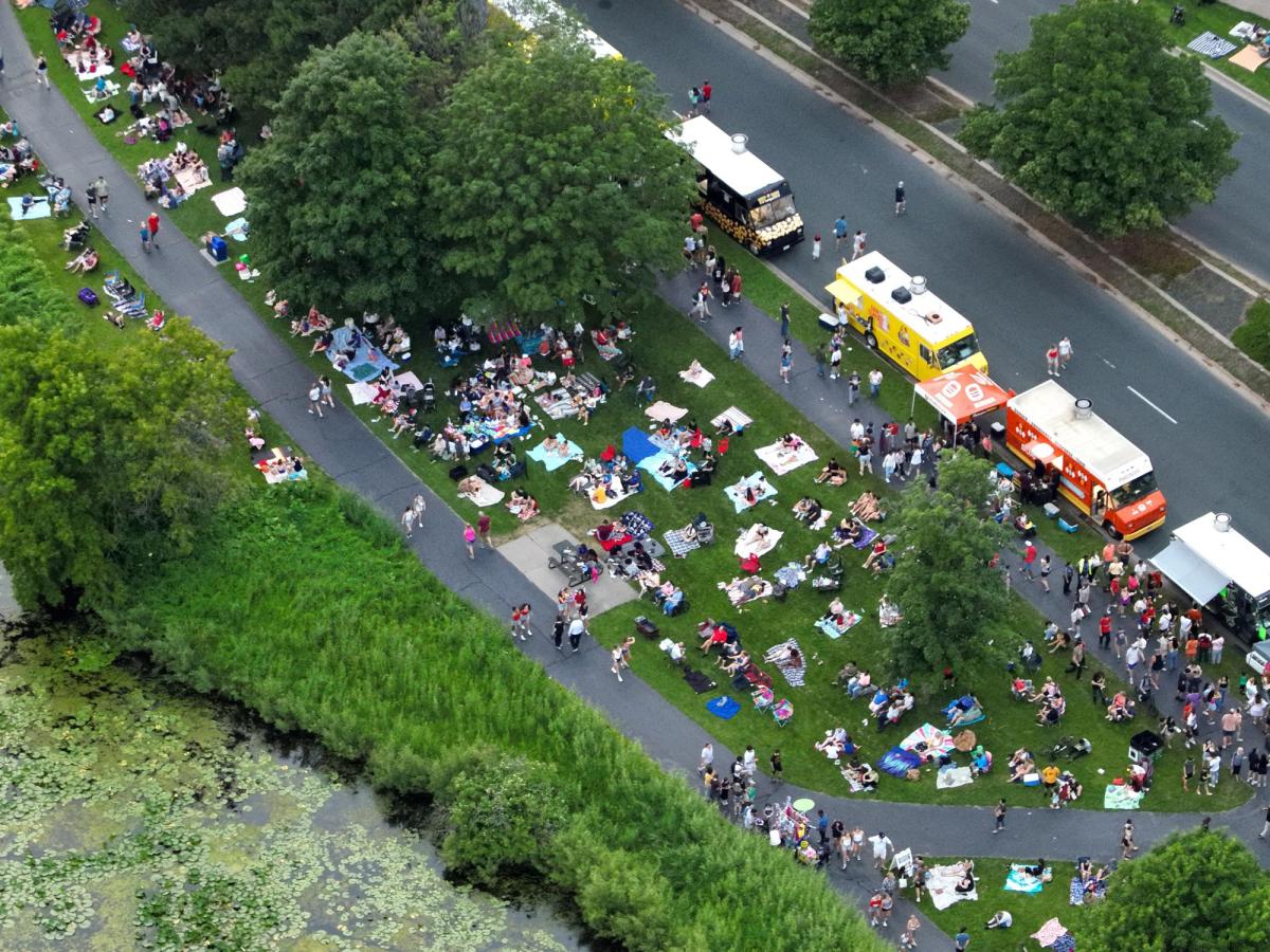 Drone image of crowd and food trucks at 2025 Summer Fete