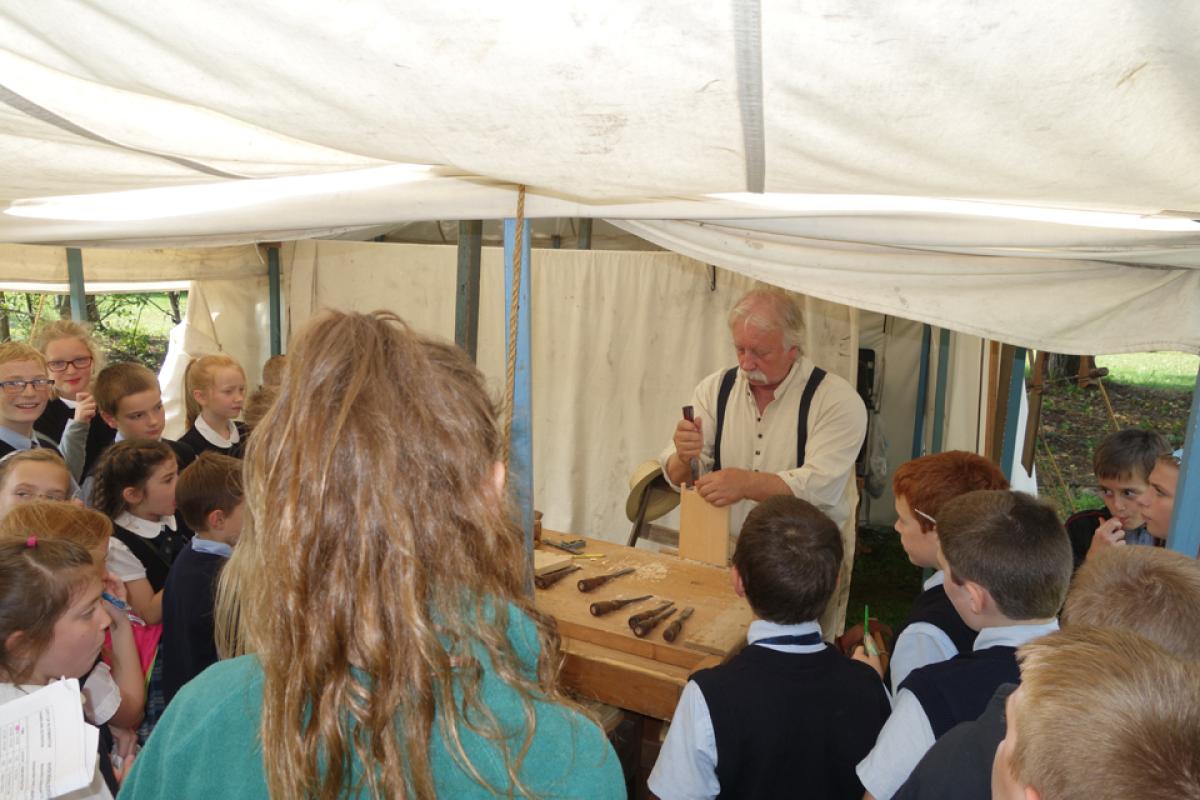 Woodworking at 2019 River Rendezvous.jpg Woodworking at 2019 River Rendezvous