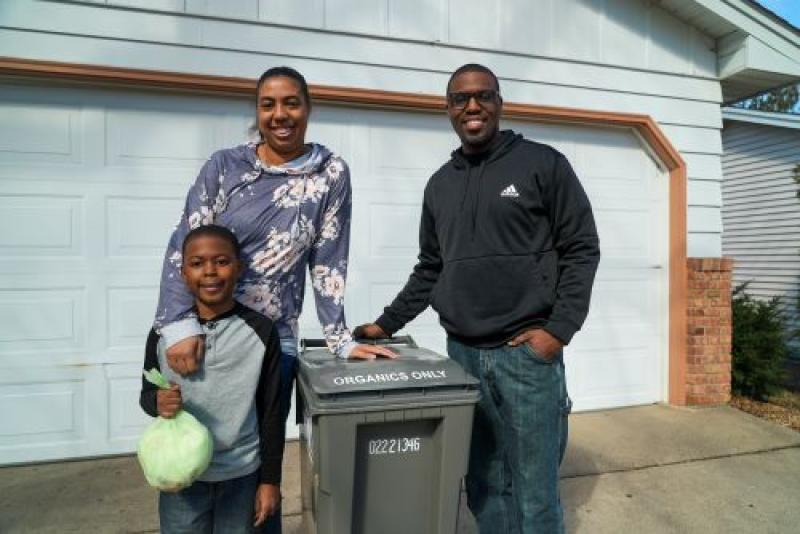 Family with organics cart image