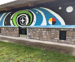 Mural in progress at Old Cedear Ave. Bridge - August 19, 2025