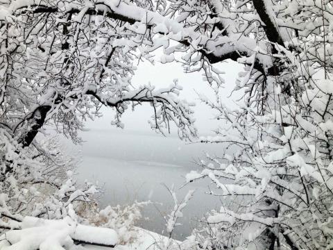 Lake with ice and snow in winter