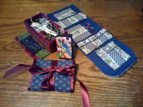 Colorful needle book sewing kits with red ribbon