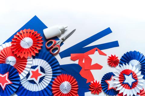 Red, white and blue 4th of July arts and crafts materials with scissors