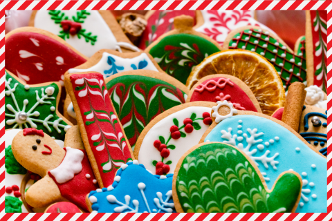 Photo of decorated holiday cookies stacked together with a red and white border