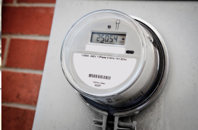 Energy meter on a brick building