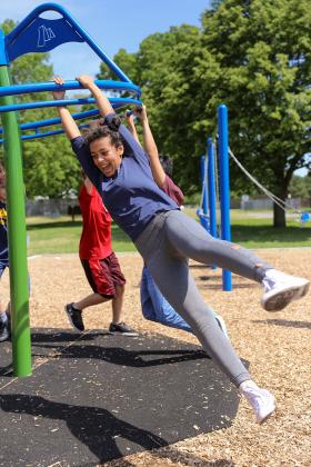 Girl on playground in park