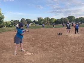 Adaptive Softball photo batter, pitcher and fielders