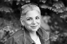 Black and white portrait of Rupa Shenoy-Thadhani