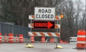 Road closed sign.