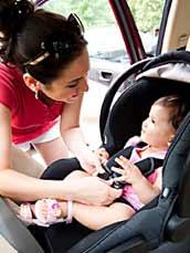 Mom with child in car seat